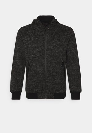 Felpa nera con zip realizzata in tessuto testurizzato. Caratterizzata da un cappuccio con cordini, tasche laterali con zip e polsini e orlo a costine.