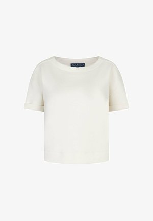 T-shirt à manches courtes couleur crème avec col rond, ourlets des manches repliés, ourlet droit, et une petite étiquette de marque à l'intérieur du col.