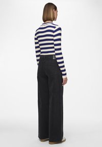 Pieces PCSELMA - Flared jeans - black denim