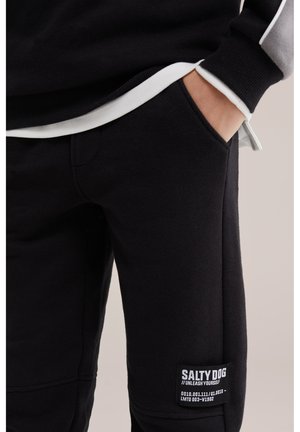 WE Fashion SALTY DOG - Pantalones deportivos - black