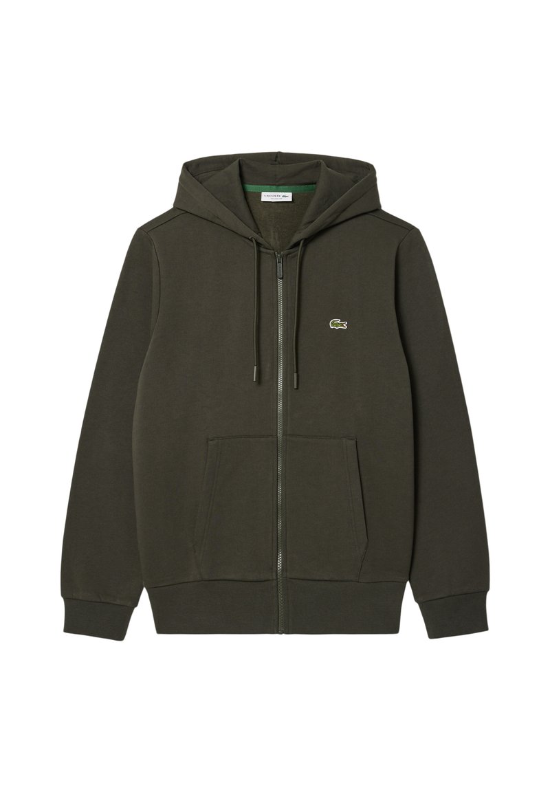 Donkergroene zip-up hoodie gemaakt van zacht stof. Heeft een grote capuchon, voorzakken en een klein geborduurd logo op de linkerkant van de borst.