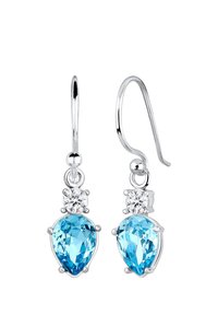 Boucles d'oreilles pendantes en argent massif avec une pierre bleu en forme de poire et une pierre ronde transparente au-dessus, le tout avec une finition lisse et polie.