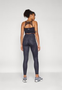Leggings da donna Nebbia Glossy look Bubble Butt leggings high waist 586 black