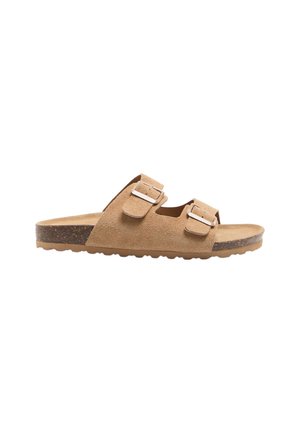 Tanfarvede ruskind slip-on sandal med to justerbare spænderem og en korksål med gummisål.