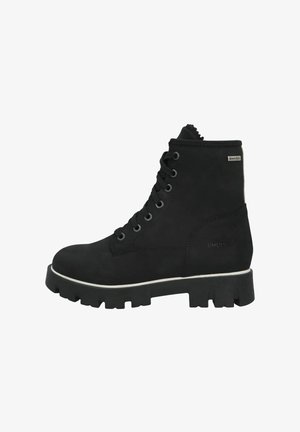 Black lace-up ankle boot with thick rugged sole, white stitching detail, and SympaTex label on the side for waterproofing.