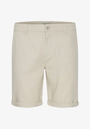 Shorts en lin beige avec un ourlet roulé, dotés d'une fermeture par bouton à l'avant et de poches latérales. Texture lisse et conception légère.