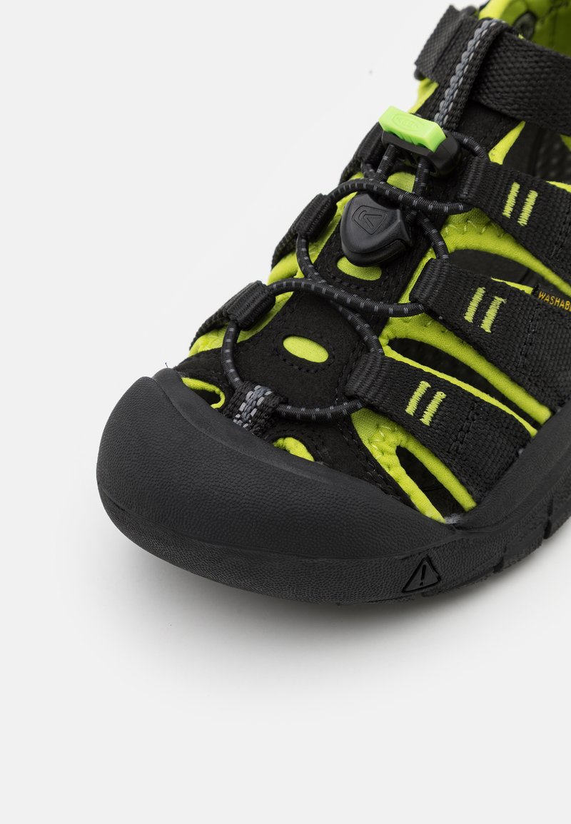 Keen Newport H2 sandals in green, with yellow accents, and black soles. Big Kids main image 3