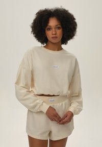 ESOTIQ BLOOVII JAX mleczny