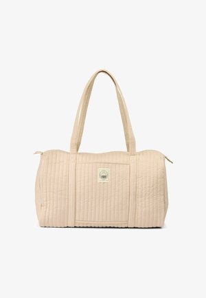 Beige quilted duffle bag with two handles, zip closure, and small rectangular patch logo on front center.