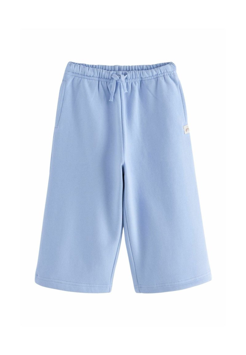 Shorts en coton bleu clair avec une taille élastique, un cordon de serrage et deux poches latérales. Présente une petite étiquette sur le côté gauche.
