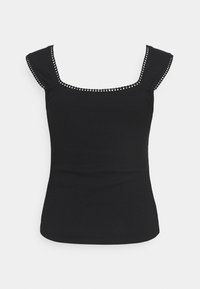 Top in cotone nero a coste con scollatura quadrata e spalline corte a volant. Presenta cuciture decorative lungo i bordi. Tessuto morbido.