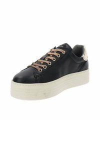 Sneaker platform in pelle nera con lacci beige, occhielli in metallo e suola spessa bianca, dotata di una linguetta sul tallone di colore chiaro.