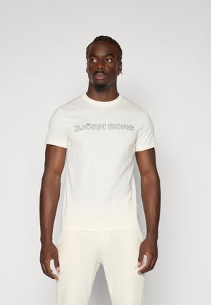 Cream-colored short-sleeve t-shirt made of soft fabric, featuring the text "BJÖRN BORG" in a bold black serif font across the chest.