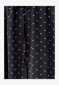 Geselecteerd, black base dot