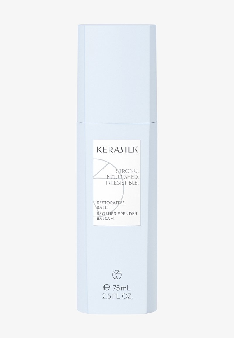 Flacon de baume réparateur Kérastil, bleu clair, étiqueté "Strong Nourished Irresistible", 75 mL, 2,5 fl. oz.
