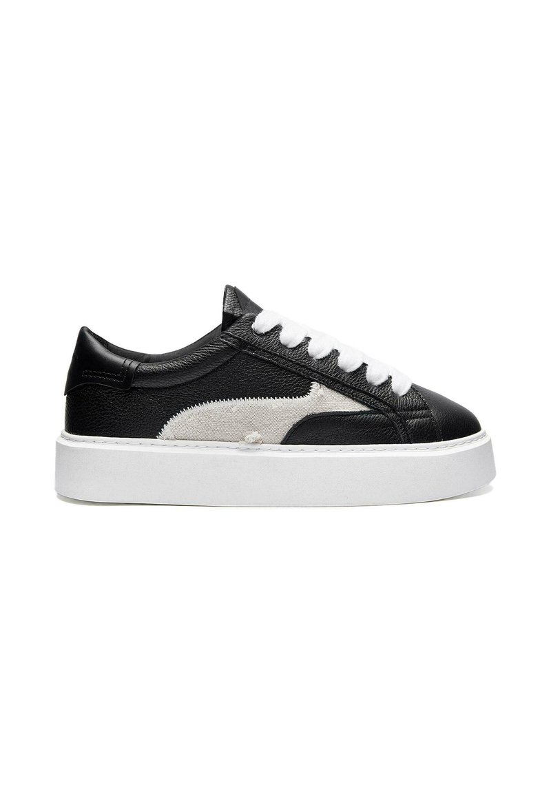 Black and gray leather sneaker with a white rubber sole, featuring white laces and textured panel details on the sides.
