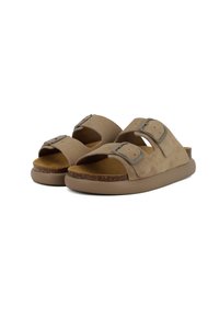 Sandali in suede beige con due fibbie regolabili, una soletta in sughero sagomata e una suola in gomma. Forma arrotondata con design aperto sulla parte anteriore.