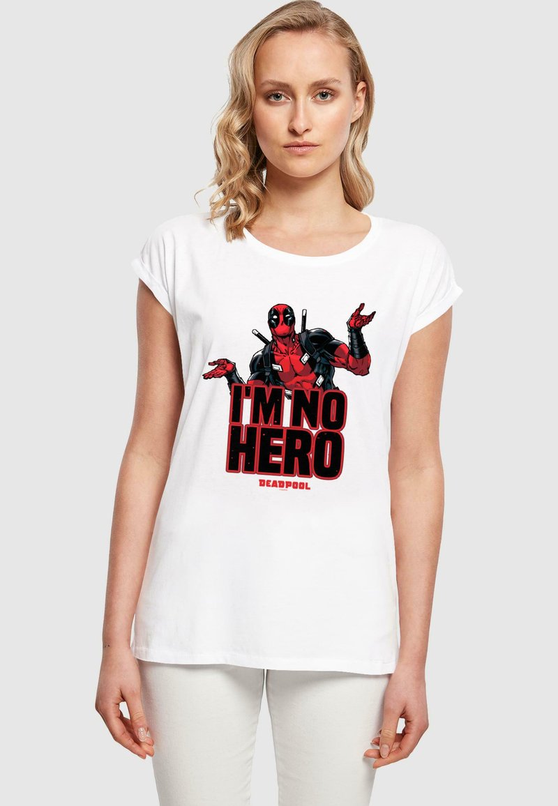 White cotton t-shirt featuring a red and black Deadpool graphic with the text "I'M NO HERO" in bold, block letters. Short sleeves, relaxed fit.