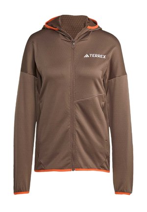 Brown zip-up jacket with orange accents and hood. Textured fabric with a knit pattern, featuring side pockets and "TERREX" logo on chest.