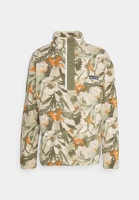 Pullover in pile con motivo floreale nei colori crema, verde e arancione. Presenta un colletto alto, bottoni a snap e una tasca sul petto con logo.