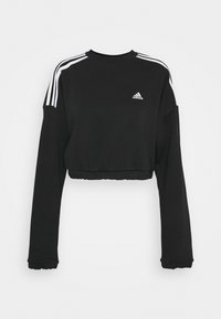 Sweatshirt noir court avec logo Adidas blanc sur la poitrine et trois bandes blanches le long des épaules et des manches.