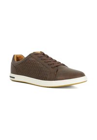 Brown leather sneakers with woven texture on the side, round toe, and white rubber sole with a subtle accent near the sole's edge.