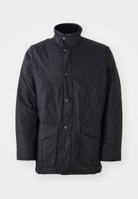 Veste noire imperméable en tissu texturé, avec un col haut, des poches avant et des fermetures à bouton-pression. Design minimaliste sans motifs.