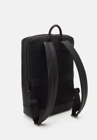 Tommy Hilfiger TRANSIT BACKPACK UNISEX - Malý batoh  - black