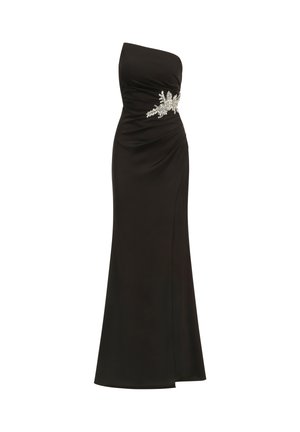 Robe de soirée noire à une épaule avec une silhouette ajustée, ornée d'une embellissement floral en cristal argenté à la taille.