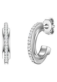 Boucles d'oreilles créoles en argent à surface lisse, ornées d'une rangée de petites pierres précieuses claires le long du bord extérieur. Fermoir à tige sécurisé.