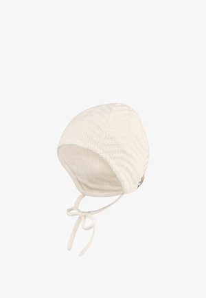 White knit hat with a textured pattern, soft lining, and adjustable tie straps. Features a rounded shape and a snug fit.