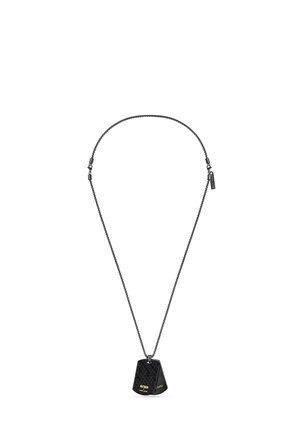 Black dog tag-style pendant with "Batman" and "Police" text, hanging from a black chain necklace.