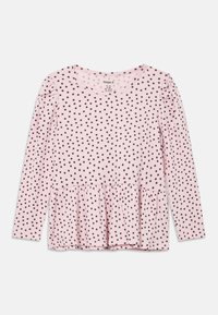 Μπλούζα με μακριά μανίκια, ριπ ύφανση σε ροζ χρώμα με μαύρες πουά, διαθέτει στρογγυλή λαιμόκοψη και σχεδιασμό με βολάν στη λαιμόκοψη.