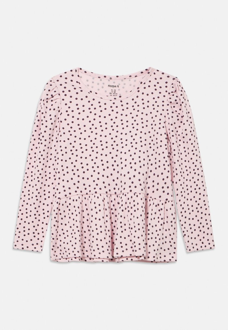 Μπλούζα με μακ ριά μανίκια, ριπ ύφανση σε ροζ χρώμα με μαύρες πουά, διαθέτει στρογγυλή λαιμόκοψη και σχεδιασμό με βολάν στη λαιμόκοψη.