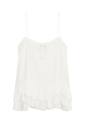 Blouse sans manches blanche en tissu léger, dotée d'un col en V avec un lien et d'un ourlet à volants superposés. Bretelles réglables.
