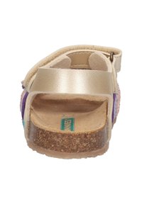 Kindersandalen met een tan leren band, kurken voetbed en meerkleurige textielaccenten. Voorzien van een achterband voor een veilige pasvorm.