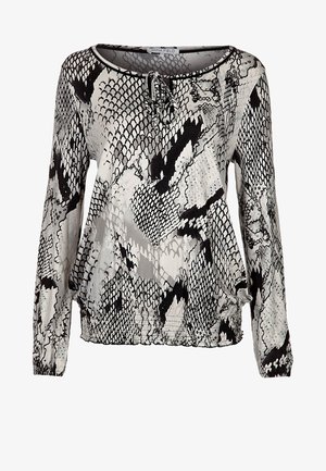 Bluzka z długim rękawem z czarno-białym wzorem węża, z okrągłym dekoltem, marszczonym dołem i miękką, gładką teksturą.