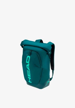 Sac à dos teal à rabat enroulable avec poche avant zippée, bretelles rembourrées et grand logo "HEAD" bleu-vert à l'avant.