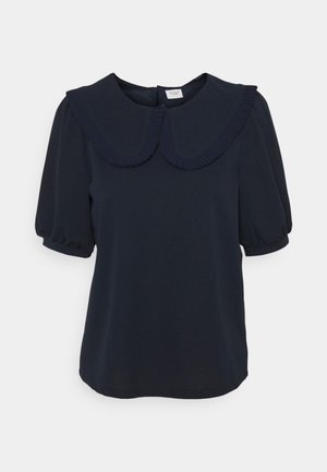 Blusa azul marino con gran cuello Peter Pan con bordes ondulados y mangas cortas abullonadas con puños.