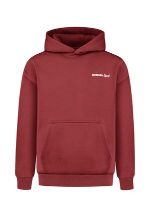 Roter Baumwollhoodie mit einer Fronttasche, gerippten Ärmelbündchen und einer Kapuze. Mit dem weißen "Smilodax Sport"-Logo auf der oberen linken Seite.