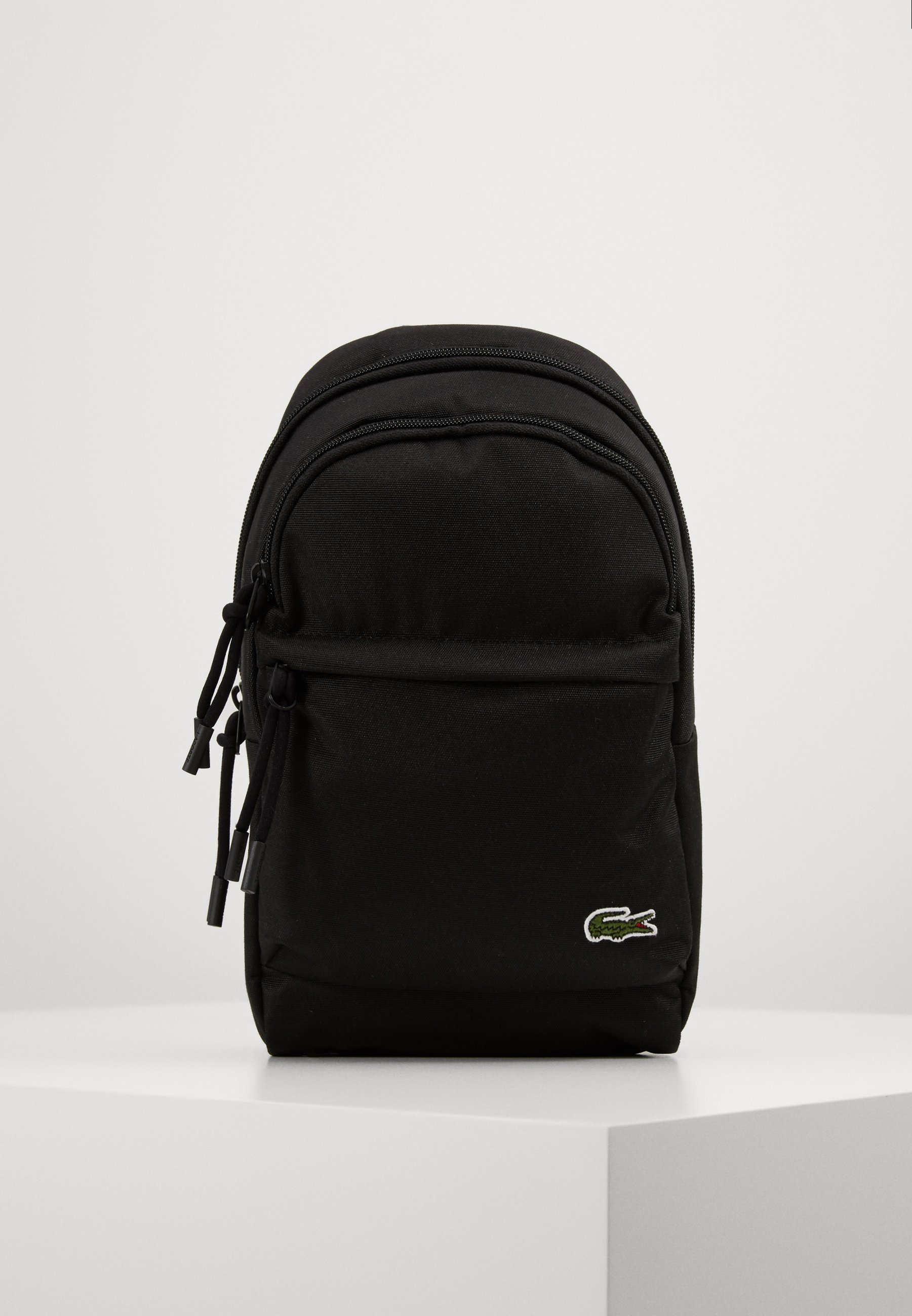 sacoche banane lacoste