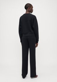 ONLY Tall ONLJETT O NECK  - Melegítőfelső - black