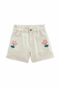 Shorts de couleur crème en coton avec une taille élastique. Présente une broderie de fleurs roses sur les deux poches avant.