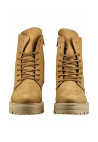 Tan suede ankle boots with a rounded toe, metal eyelets, and brown laces. Features a textured outsole for grip and a padded collar.
