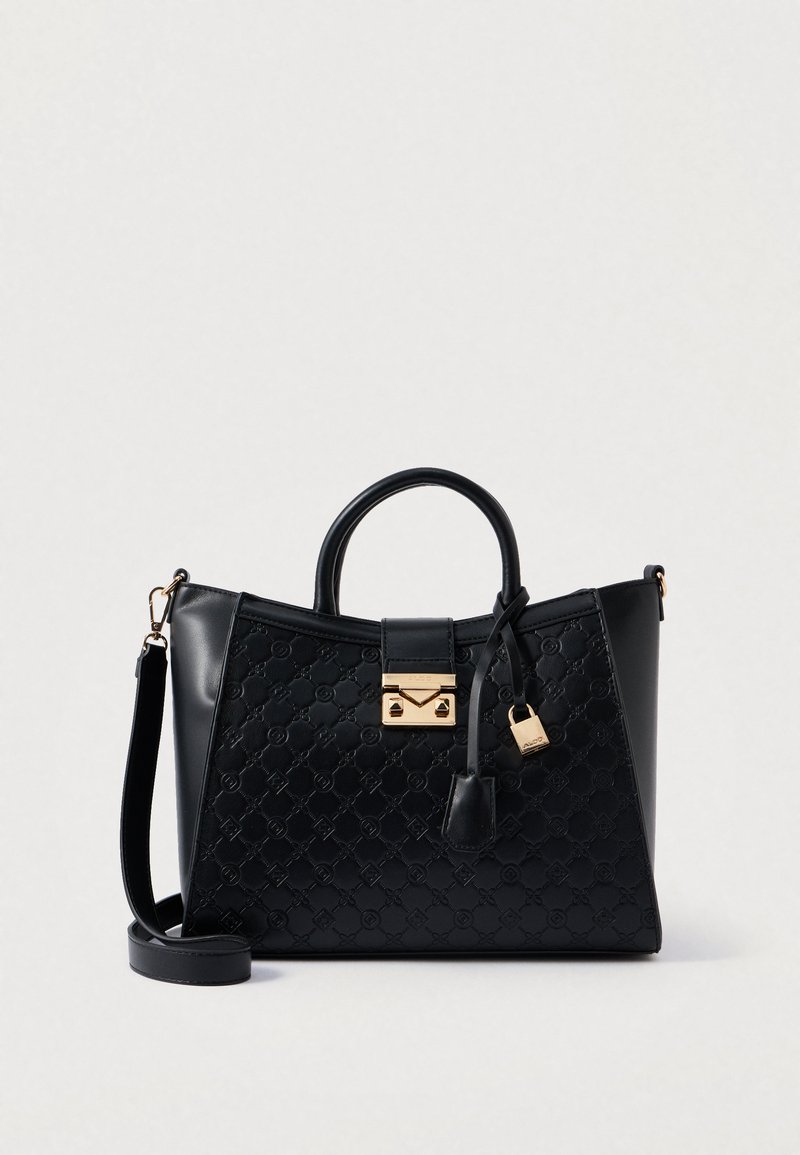 Crna strukturirana torba od teksturirane kože, sa zlatnim hardverom, detaljem brave i dvostrukim gornjim ručkama uz podesivu naramenicu.