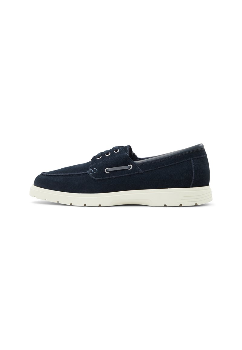 Navy suede casual shoes with a low profile, two eyelets, and white rubber sole. Features a stitched design and textured accents.