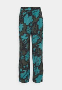 Broek met bloemenpatroon in donkergroen met opvallende turquoise bloemen. Heeft een losse pasvorm en een elastische tailleband voor comfort.