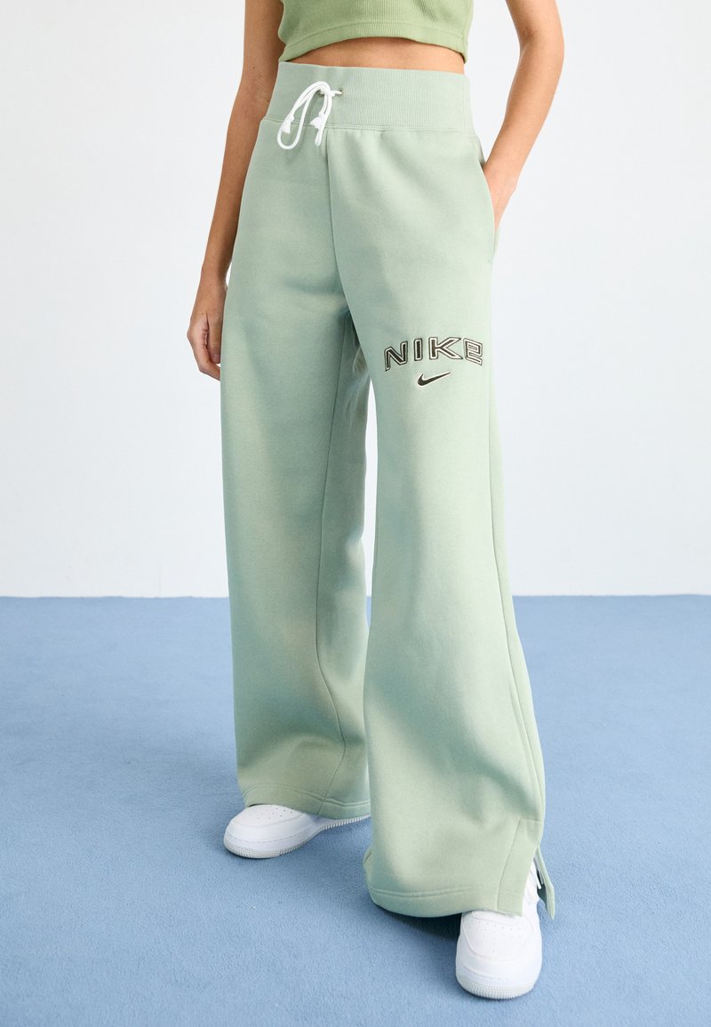 Nike Sportswear LOGO - Treniņtērpa apakšdaļas - jade horizon