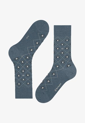 Blauwe sokken met een ruitpatroon en kleine iconen. Gemaakt van gebreid materiaal, met een gladde textuur en een contrasterend ontwerp met een witte rand.