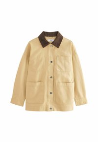 Beige kanva-takki ruskealla samettikauluksella, nappikiinnitys ja kaksi suurta etutaskua. Ominaisuuksiin kuuluu rento malli ja minimaalinen yksityiskohtaisuus.